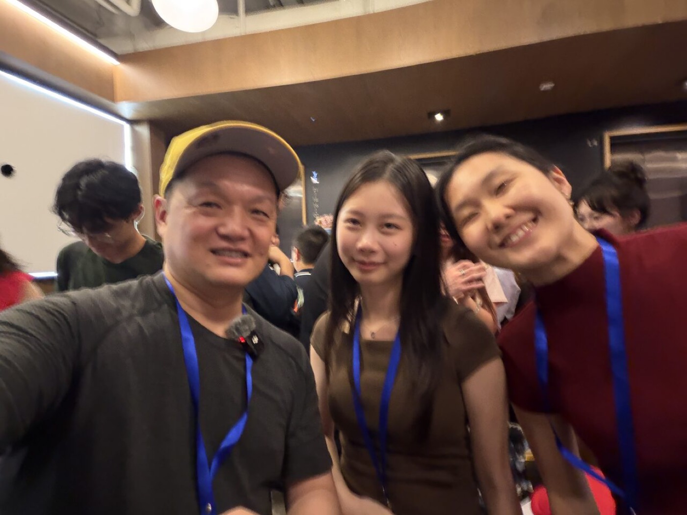 A group of attendees smiling for a photo