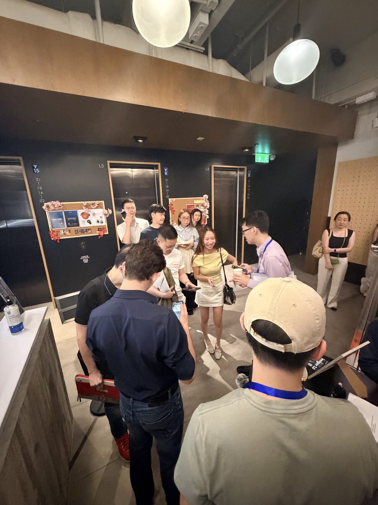 A standing crowd watching the talks