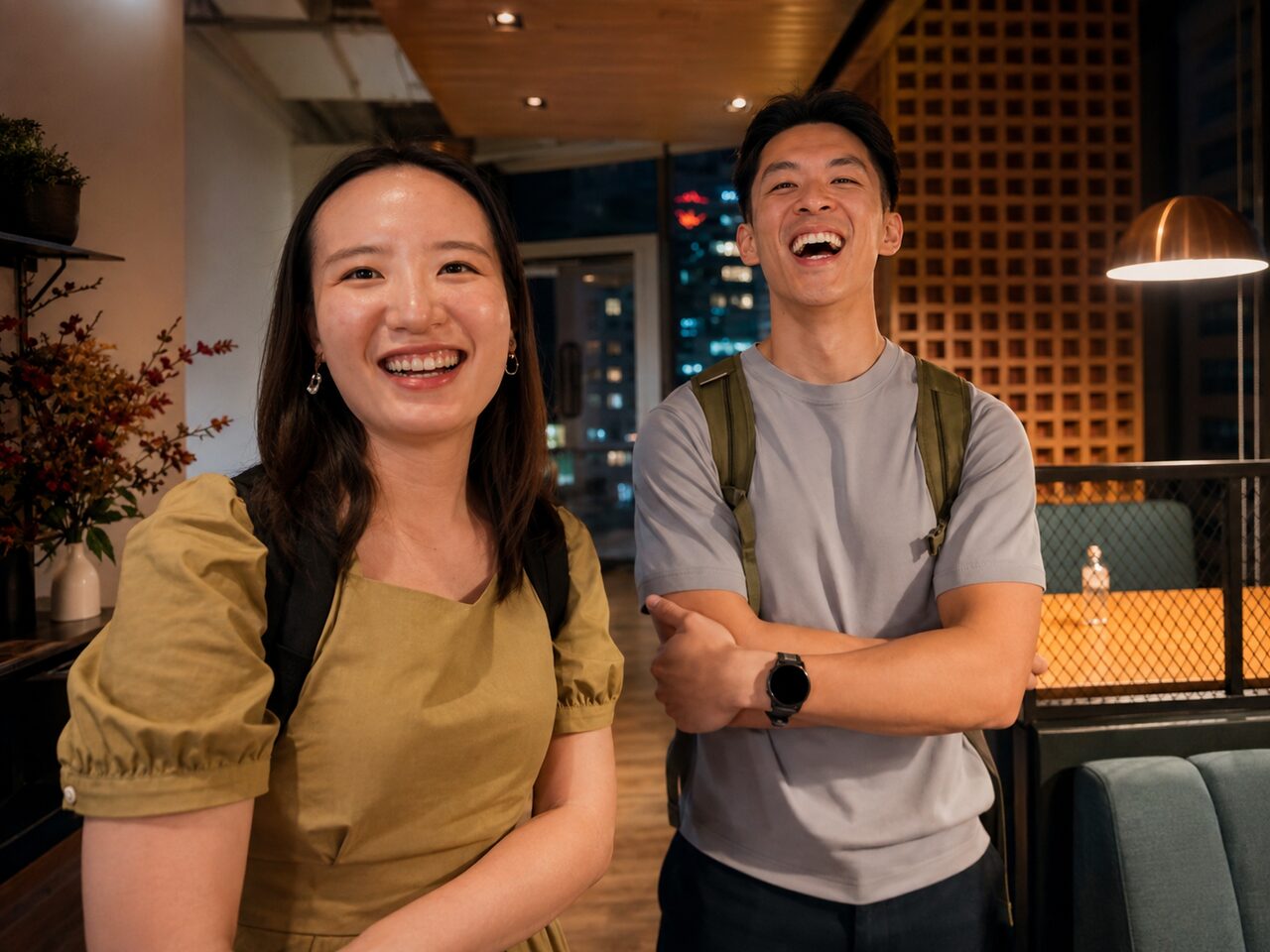 Two attendees laughing for the camera