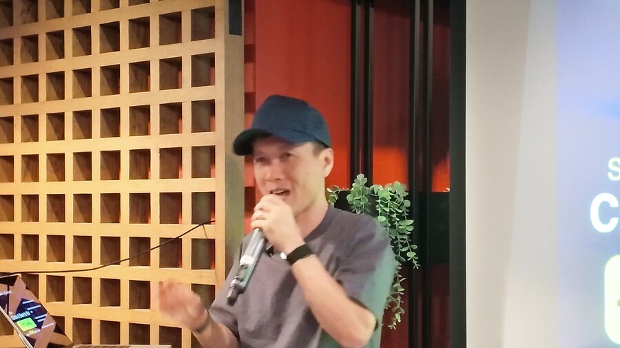 The HolyCrab.ai speaker presenting at The Hive